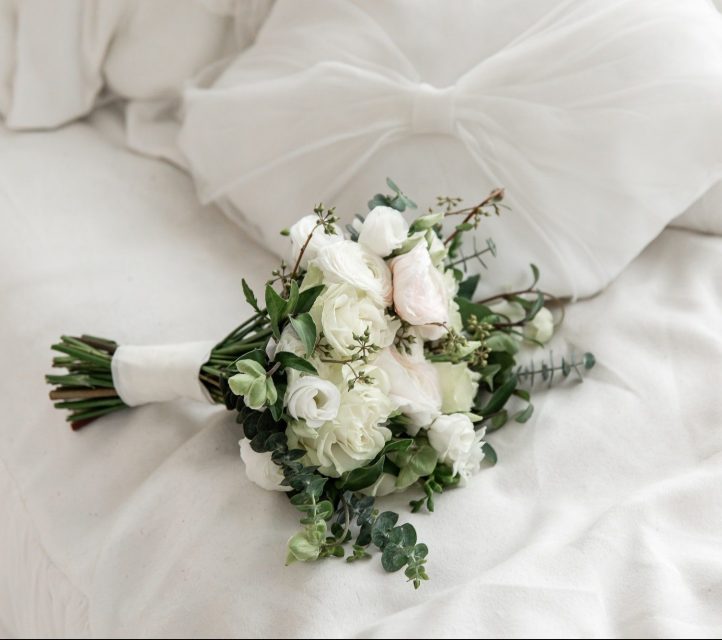 Bride's bouquet with white flowers. Wedding ceremony.